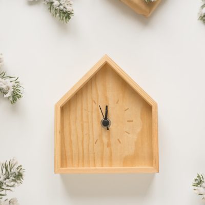 Christmas and New Year still life. Wooden clock shows five minutes to midnight